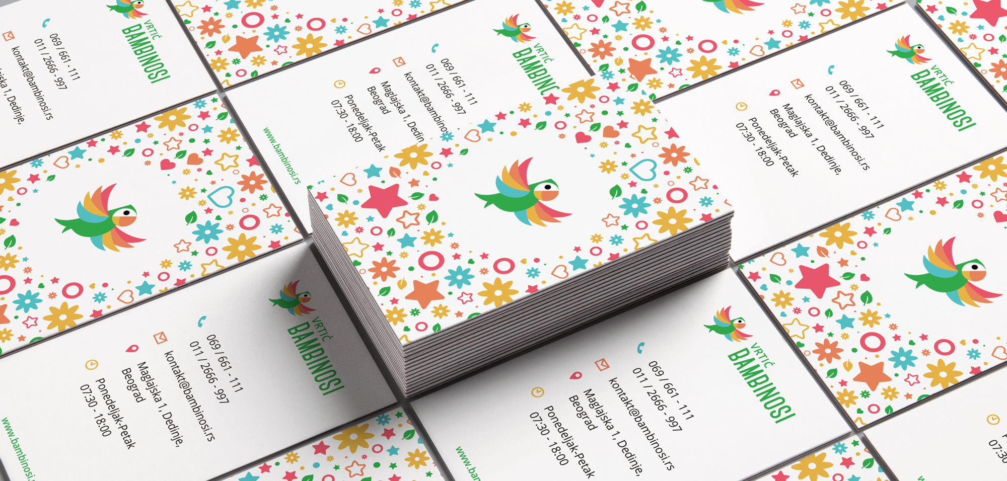 bambinosi brand identity design - mockup of a colorful business card design using the brand pattern design